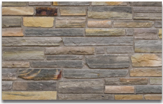 Warm-toned natural stone veneer wall cladding with stacked stones in gray, tan, and rust colors