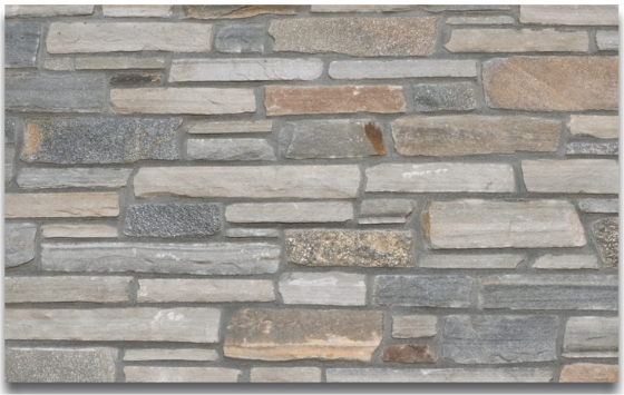 Mixed-color natural stone veneer wall cladding with stacked rectangular stones in neutral tones