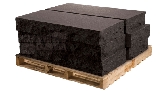 Black sandstone natural stone steps stacked on a wooden pallet for outdoor landscaping