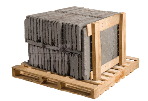 Bluestone tumbled natural stone pavers bundled on a wooden pallet for patios and walkways