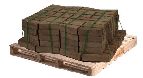 Brownstone natural stone fire pit kit on a wooden pallet