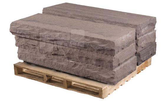 Brownstone natural stone steps stacked on a wooden pallet for outdoor landscaping