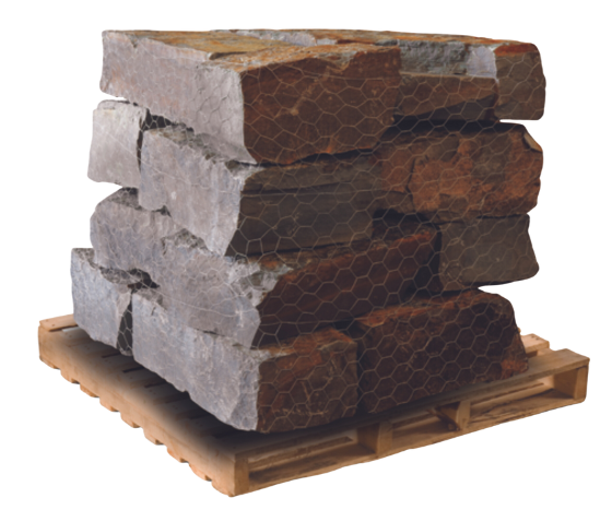 Colonial natural stone chunks stacked on a wooden pallet