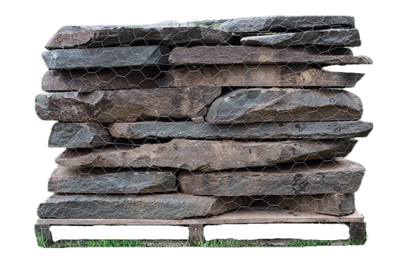 Colonial natural stone garden path pavers stacked on a wooden pallet