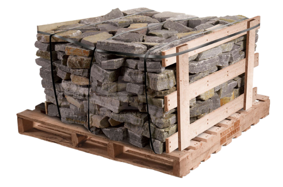 Saratoga granite natural stone wallstone stacked on a wooden pallet