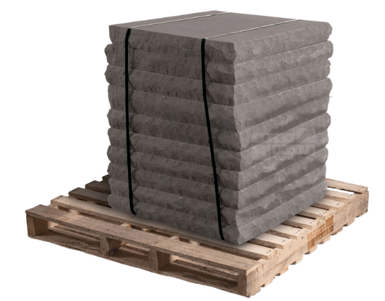 Slate grey natural stone pillar caps stacked on a wooden pallet for outdoor columns