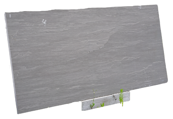 Slate grey natural stone slab on a wooden pallet