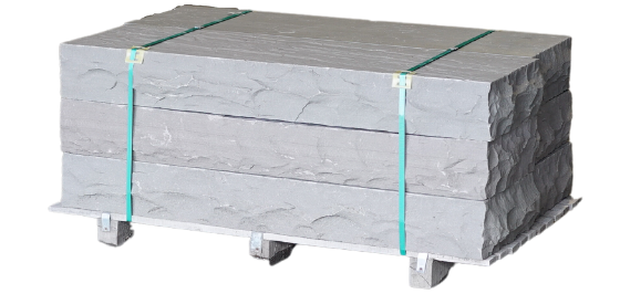 Slate grey natural stone steps stacked on a wooden pallet for outdoor landscaping