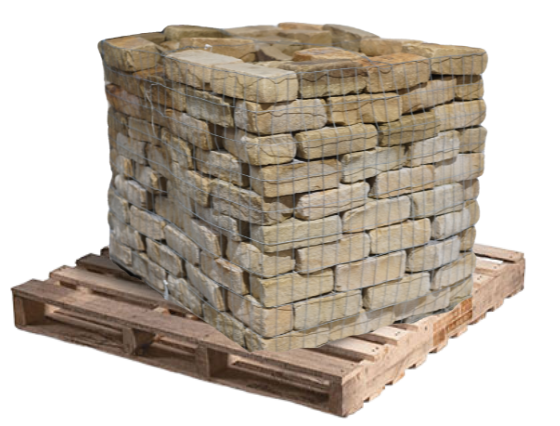 Tumbled Tennessee natural stone cobbles bundled on a wooden pallet